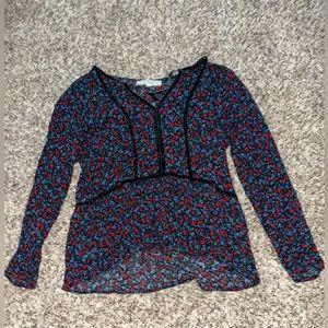 Medium; Black with red and blue flowers; Long sleeve low neck with ties
